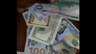 Tristina Millz couting cash